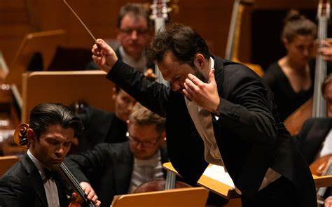 Popelka conducts Dvorak and Strauss